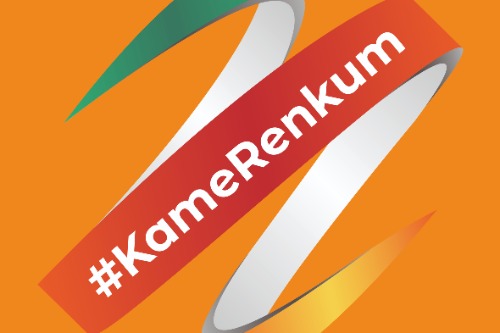 Spiraal logo in de kleuren van Kameroen met tekst: #KameRenkum